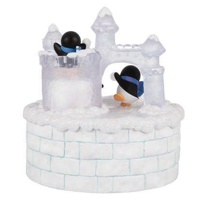 Snowball Fun Musical With Light and Motion — 2026 Hallmark Keepsake Christmas Ornament featuring playful penguins near an ice castle.