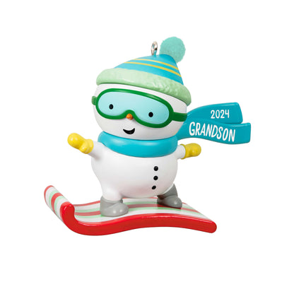 Grandson Snowboarding Snowman — Hallmark Keepsake Christmas Ornament, colourful plastic ornament on a surfboard with goggles and festive scarf.