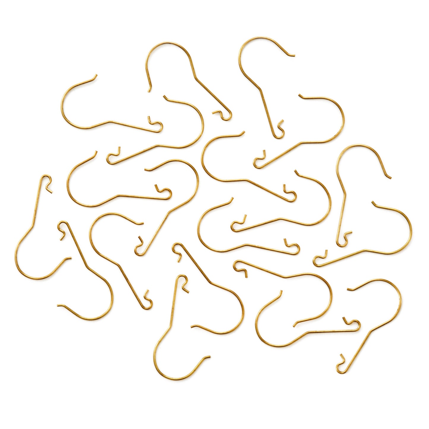 Hallmark Keepsake Christmas Ornament Hooks (Brass, Metal), Set of 20, close up view of gold-colour metal hooks arranged on a flat surface.