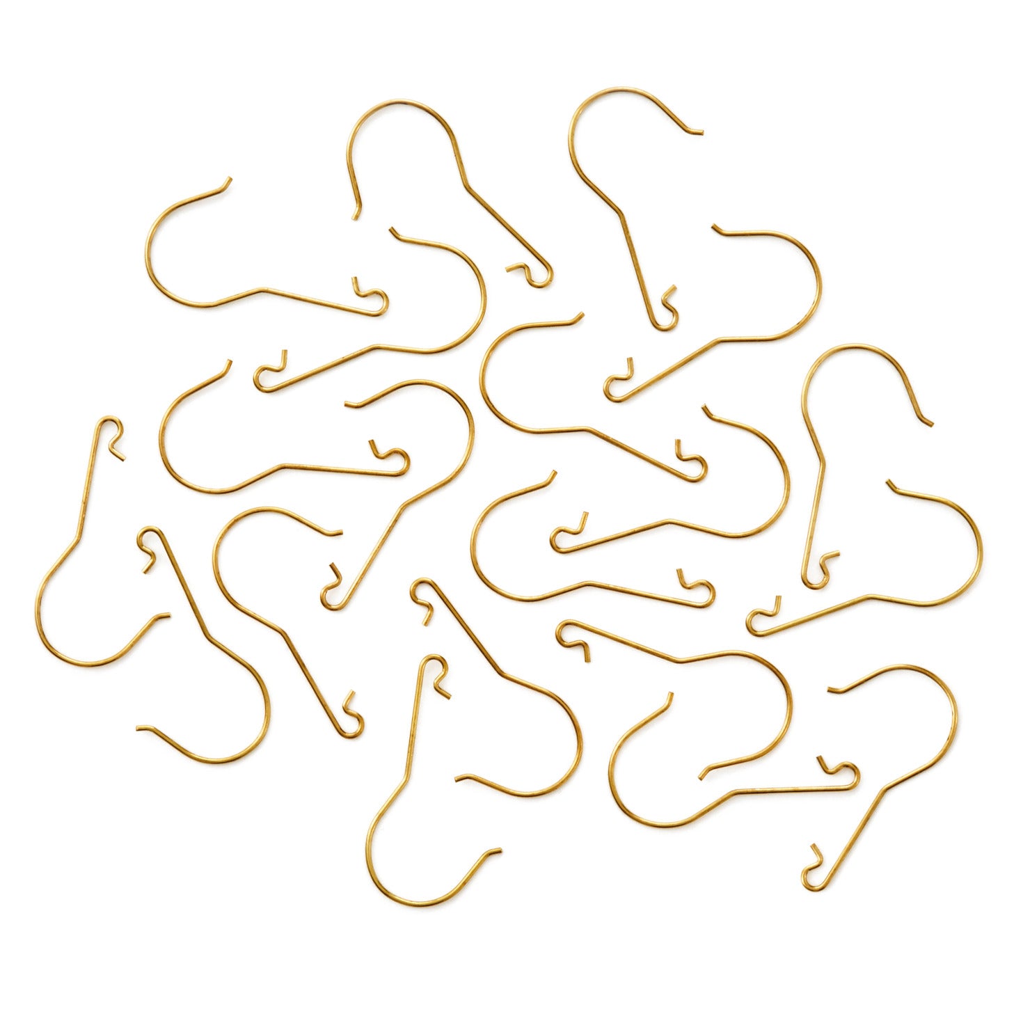 Hallmark Keepsake Christmas Ornament Hooks (Brass, Metal), Set of 20, close up view of gold-colour metal hooks arranged on a flat surface.