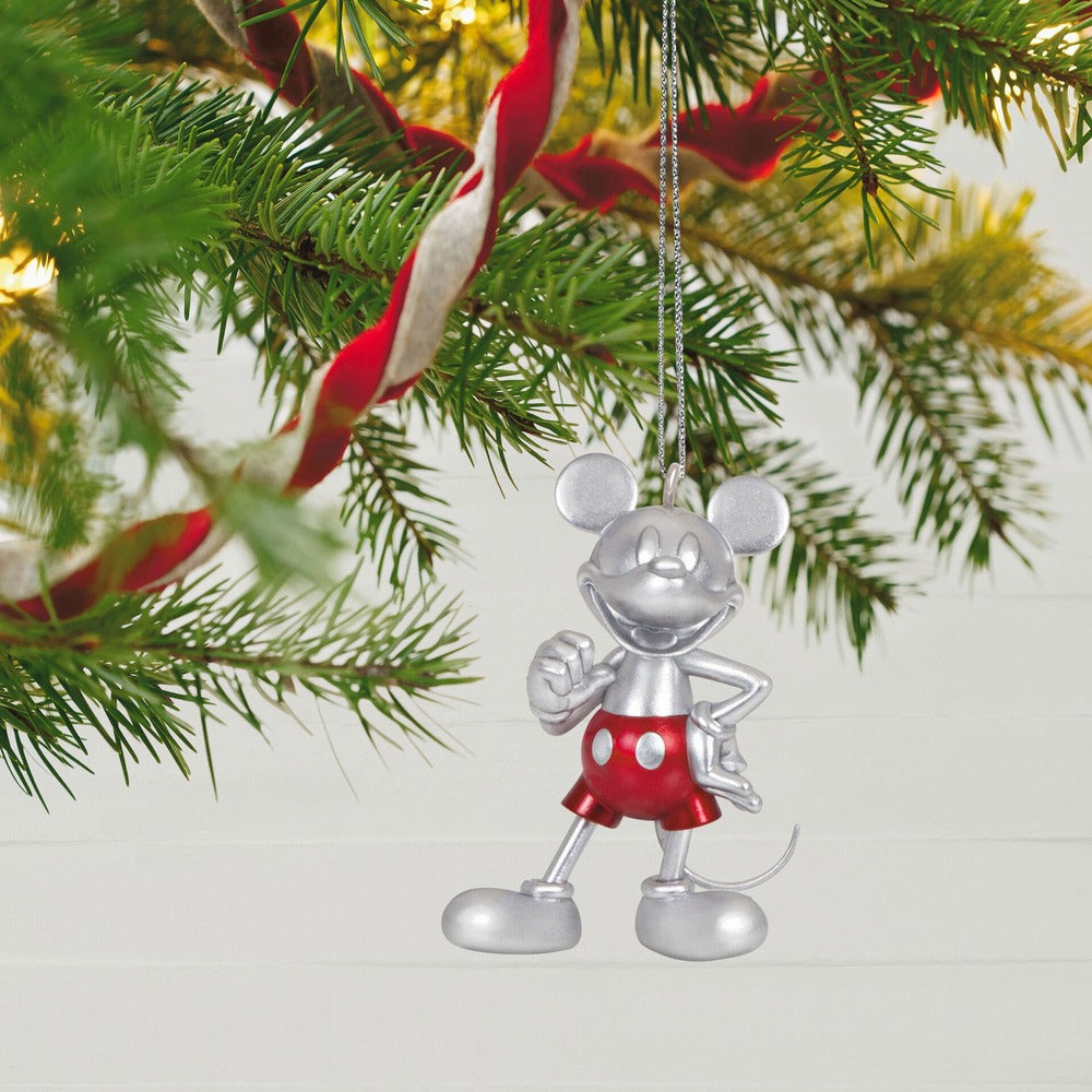 Disney 100 years of wonder classic characters, set of 4 — Hallmark keepsake Christmas ornament featuring a smiling Mickey Mouse in brushed nickel with red accents, hanging from a Christmas tree.