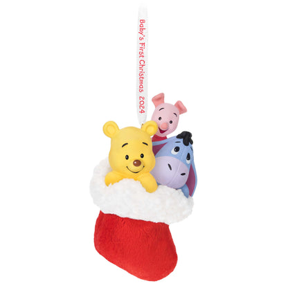 Disney Winnie the Pooh, A Snuggly First Christmas — Hallmark Keepsake Christmas Ornament in a fluffy red stocking with Pooh, Piglet, and Eeyore.