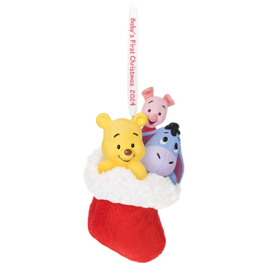 Disney Winnie the Pooh, A Snuggly First Christmas — Hallmark Keepsake Christmas Ornament in a fluffy red stocking with Pooh, Piglet, and Eeyore.