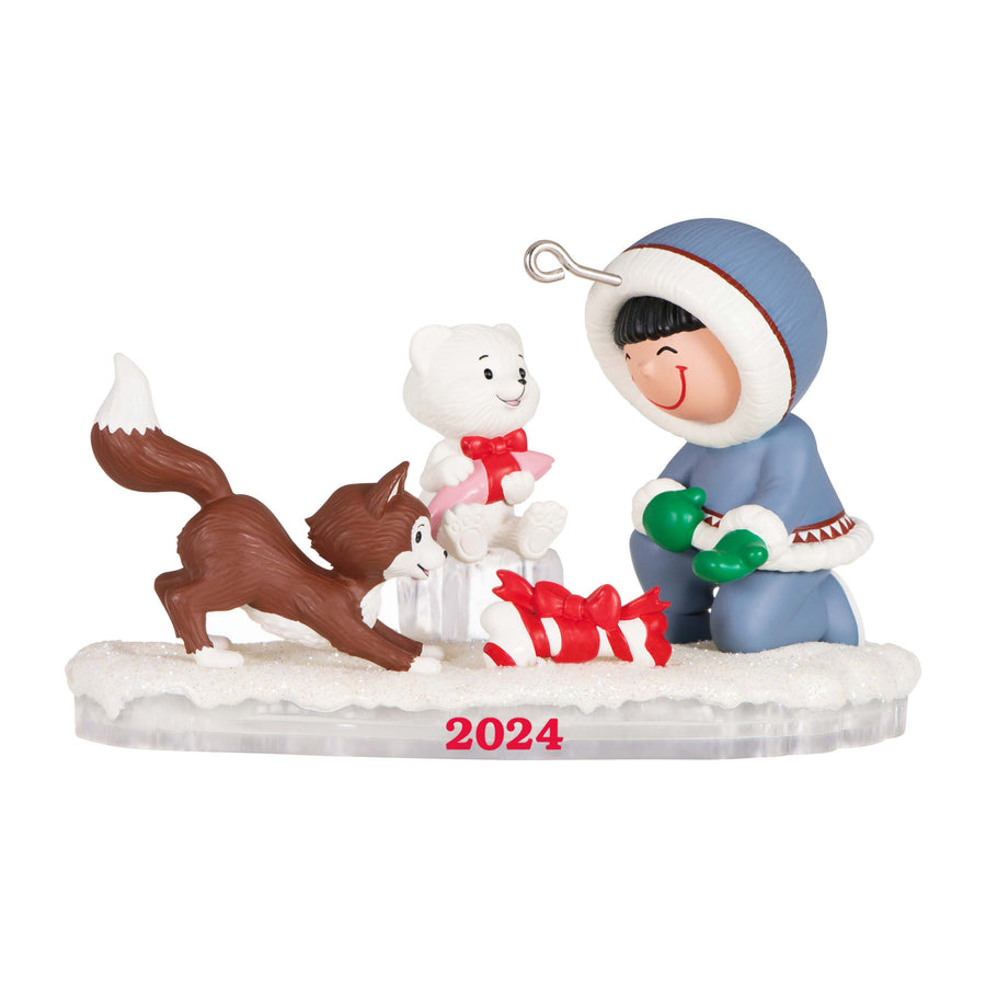 Frosty Friends — Hallmark Keepsake Christmas Ornament featuring a child with a polar bear and a fox in a winter scene, 2024.