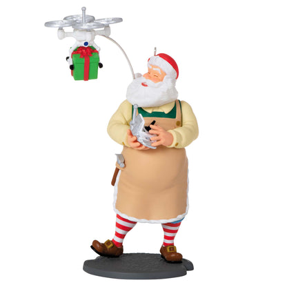 Toymaker Santa — Hallmark Keepsake Christmas Ornament features a jolly Santa with a drone delivering gifts, crafted from plastic in detailed colours.