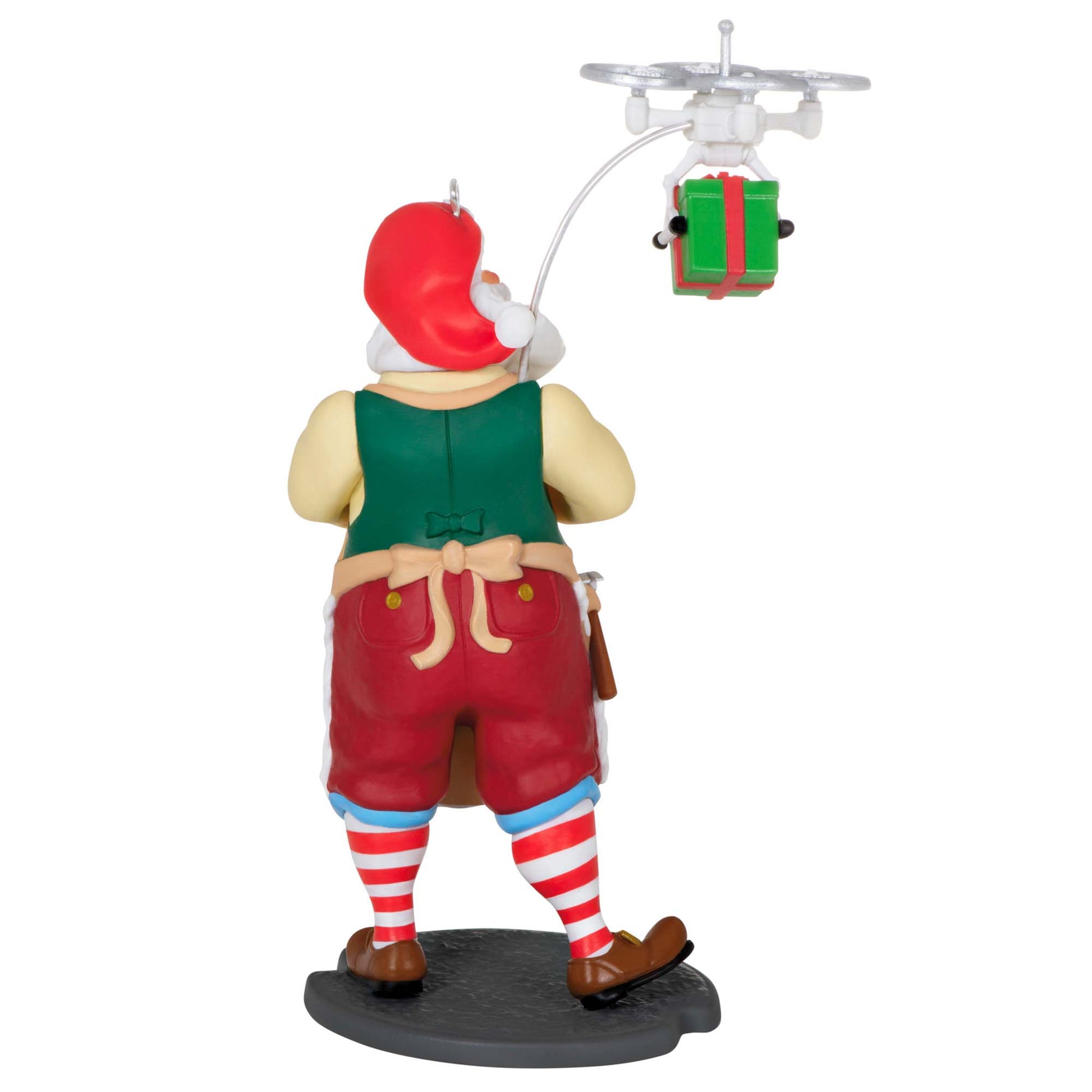 Toymaker Santa — Hallmark Keepsake Christmas Ornament, plastic, colourful, showing Santa testing a drone with a gift.