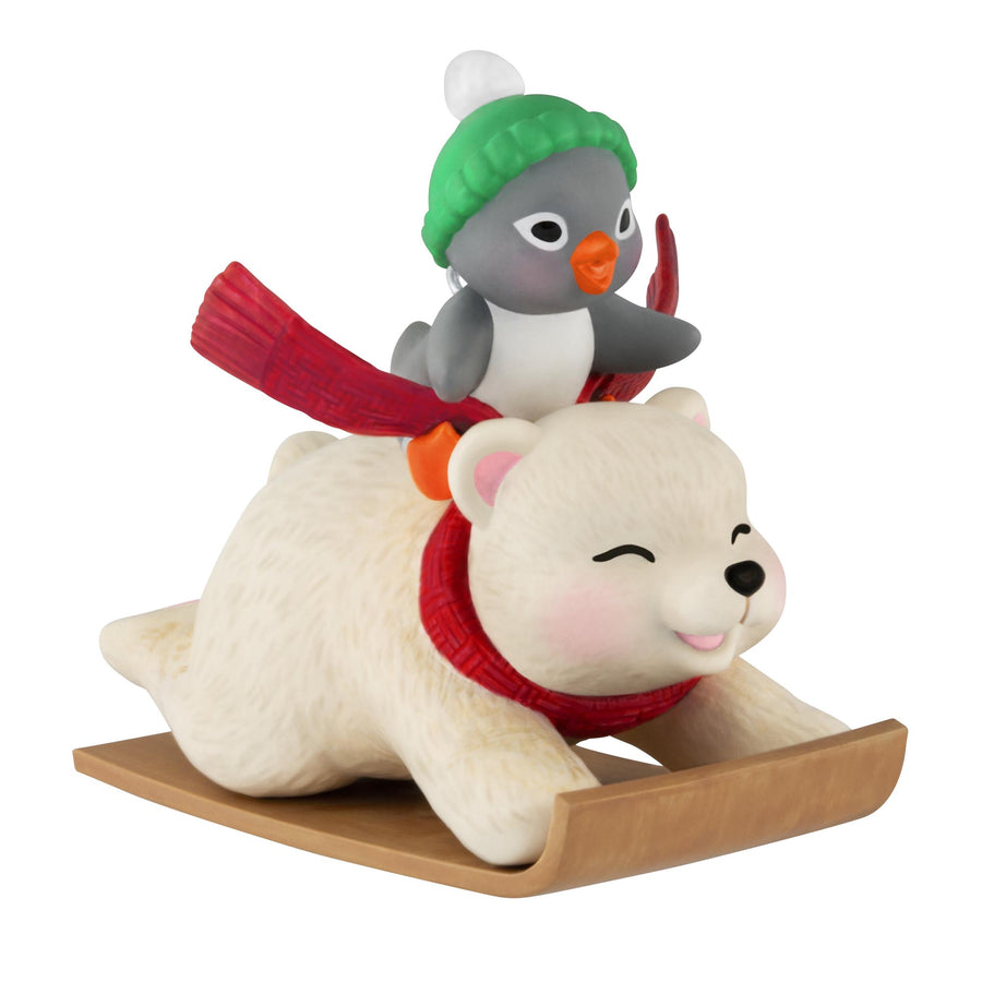 Sledding Sidekicks, 25th in the Snowball and Tuxedo Series — 2025 Hallmark Keepsake Christmas Ornament featuring Snowball the polar bear and Tuxedo the penguin on a toboggan.