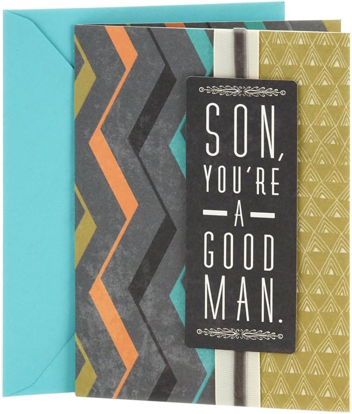 Hallmark Birthday Greeting Card to Son (Good Man, Great Son) with colourful chevron design and turquoise envelope, flat lay view.