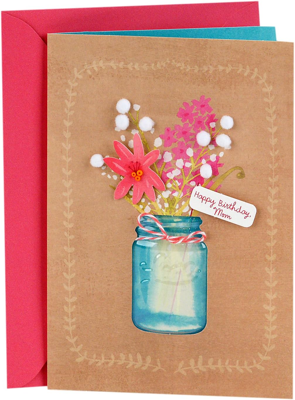 Hallmark Signature Birthday Card for Mom (Flowers) featuring a floral design in a jar, with a pink envelope, close up view.