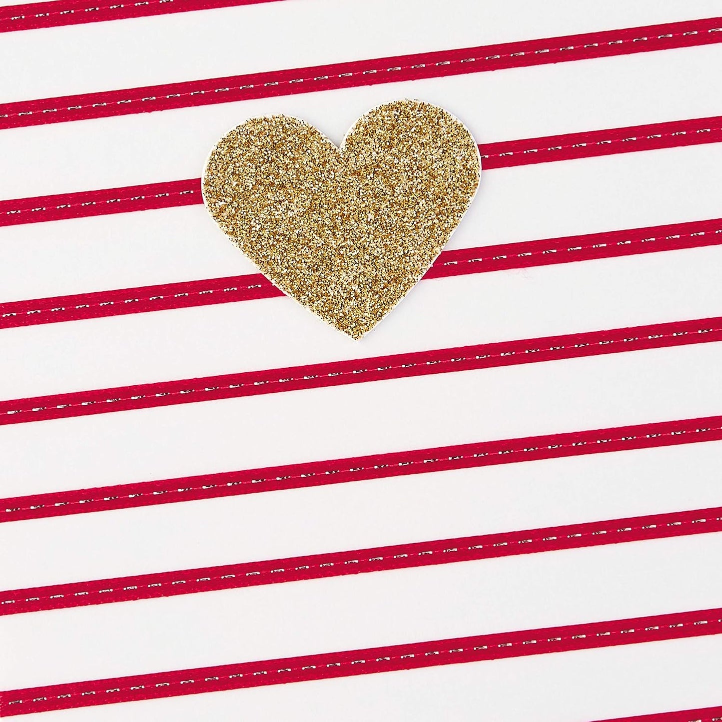 Hallmark Signature Women's Birthday Greeting Card (Heart and Stripes) with a gold glitter heart on red striped background, flat lay view.