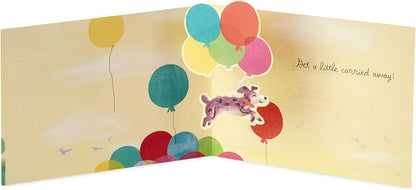 Hallmark Paper Wonder Pop Up Birthday Card (Get Carried Away) featuring a dog flying with colourful balloons in 3D design.
