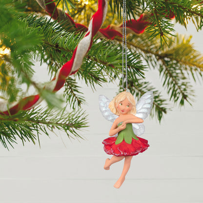 Fairy Messengers Carnation Fairy — Hallmark Keepsake Christmas Ornament, decorative tree ornament, with glittery wings and pink dress, hanging on Christmas tree.