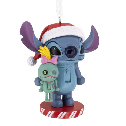 Disney Stitch Nutcracker - Hallmark Christmas Ornament featuring Stitch in a Santa hat holding Lilo's ragged doll Scrump, hanging ornament.