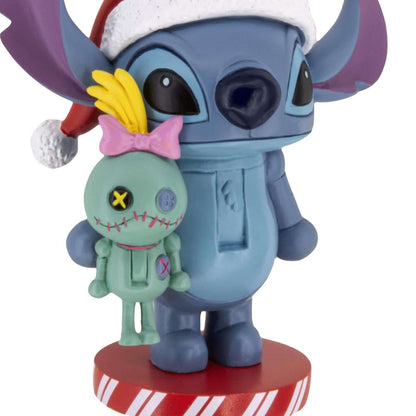Disney Stitch Nutcracker - Hallmark Christmas Ornament featuring Stitch in a Santa hat with Scrump doll, colourful and festive design.