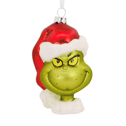 Hallmark Christmas Ornament (Dr. Seuss's How the Grinch Stole Christmas! Blown Glass) with bright green Grinch face and red Santa hat, hanging view.