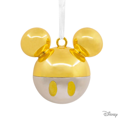 Hallmark Christmas Ornament (Disney Mickey Mouse Gold Icon Premium Metal) in shiny gold and white metal, featuring iconic Mickey ears, flat lay.