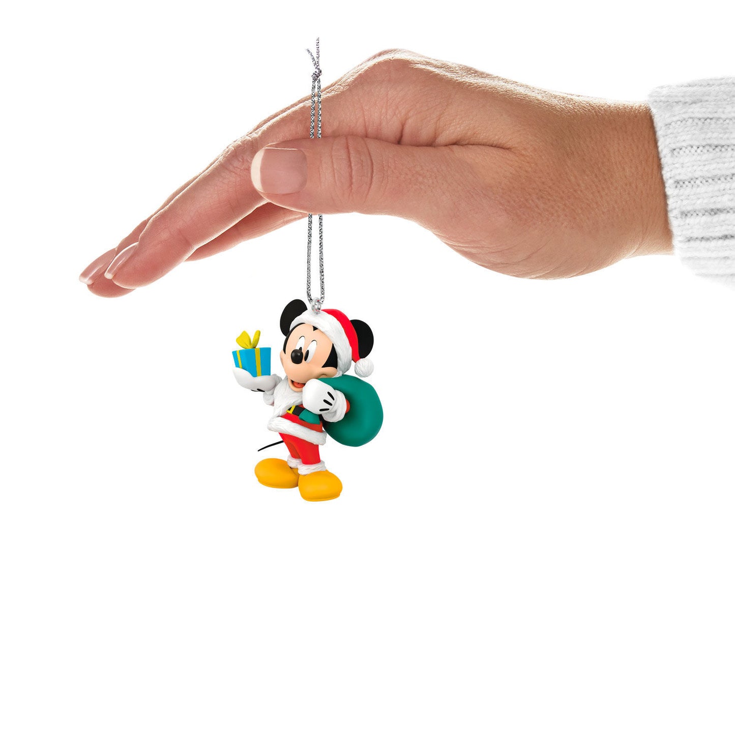 Disney All About Mickey! Santa Mickey — Hallmark Keepsake Christmas Ornament held above a hand, featuring Mickey in a Santa suit with a gift.