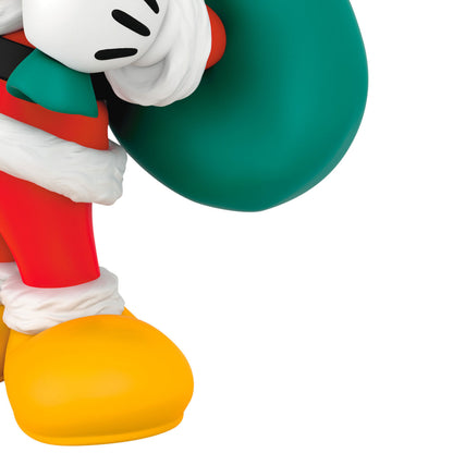 Disney All About Mickey! Santa Mickey — Hallmark Keepsake Christmas Ornament in Santa suit, holding a green bag, close up view.