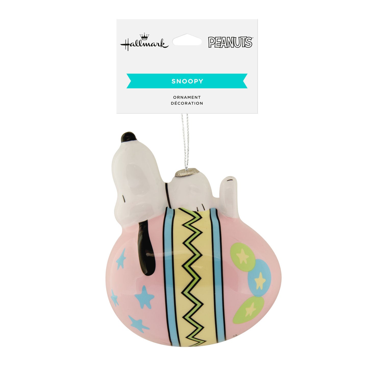Snoopy ornament with a pink base and colorful patterns, featuring the Hallmark and Peanuts logos.