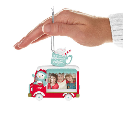 Grandma's Sweets Photo Frame — Hallmark Keepsake Christmas Ornament held in hand, featuring a snowman food truck and photo space.