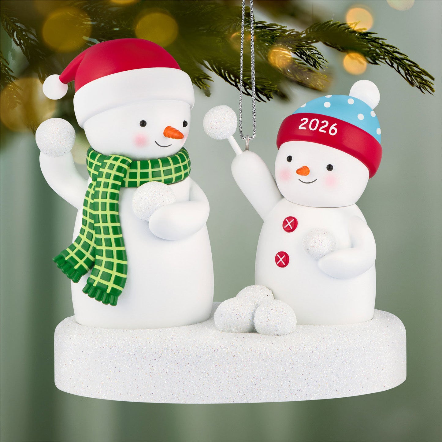 Snowball Fight 2026 Musical — 2026 Hallmark Keepsake Christmas Ornament featuring cheerful snowmen in winter attire with snowballs.