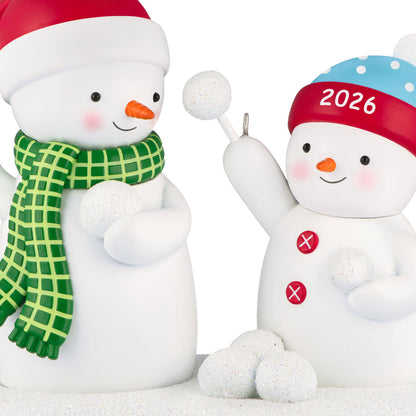 Snowball Fight 2026 Musical — 2026 Hallmark Keepsake Christmas Ornament featuring two cheerful snowmen in winter attire, playing with snowballs.