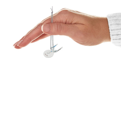 Star Trek™: The Motion Picture U.S.S. Enterprise NCC-1701 Refit (Miniature) — Hallmark Keepsake Christmas Ornament held in hand, showcasing intricate details.