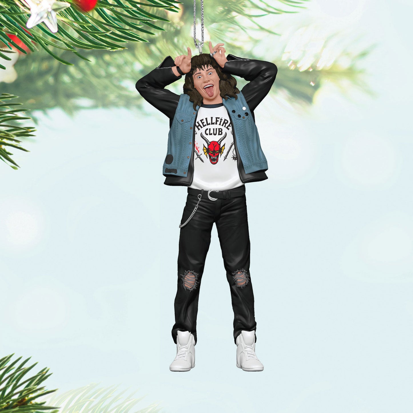 Netflix Stranger Things, Eddie Munson — Hallmark Keepsake Christmas Ornament featuring Eddie in a Hellfire Club T-shirt and leather jacket, hanging from the Christmas tree.