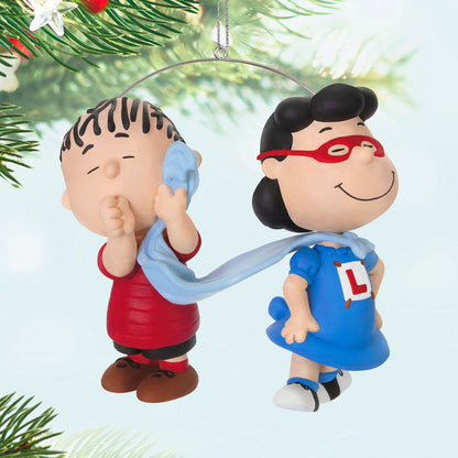 The Peanuts® Gang, Super Lucy and Linus — Hallmark Keepsake Christmas Ornament featuring Lucy in a superhero outfit with Linus holding his blue blanket.