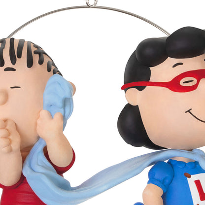 The Peanuts® Gang, Super Lucy and Linus — Hallmark Keepsake Christmas Ornament featuring Lucy in a superhero outfit with Linus holding his blue blanket.