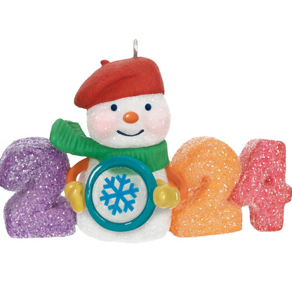 Sweet Decade — 2024 Hallmark Keepsake Christmas Ornament featuring a glittery snowman in a red beret holding a snowflake.