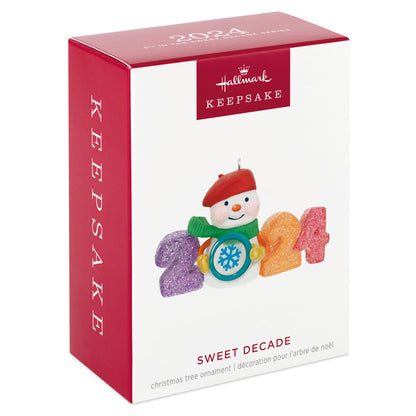 Sweet Decade — 2024 Hallmark Keepsake Christmas Ornament featuring a glittery snowman and colourful number packaging with festive design.