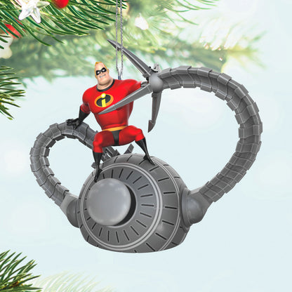 Disney and Pixar The Incredibles, 20th Anniversary Battling the Omnidroid — Hallmark Keepsake Christmas Ornament featuring Mr. Incredible on an Omnidroid, hanging among tree branches.