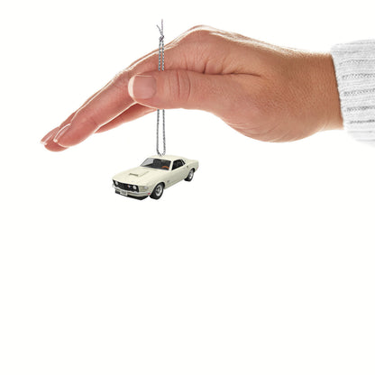 Lil' Classic Cars 1969 Ford Mustang Boss 429 (Miniature) — Hallmark Keepsake Christmas Ornament held by a hand, featuring a metal design and silver string.