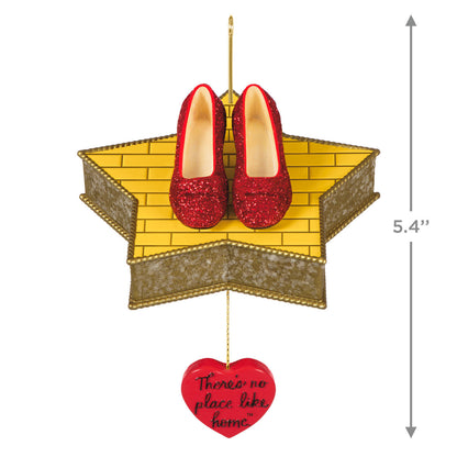 The Wizard of Oz™ There's No Place Like Home™ — Hallmark Keepsake Christmas Ornament featuring sparkly red Ruby Slippers on a star platform with heart charm.
