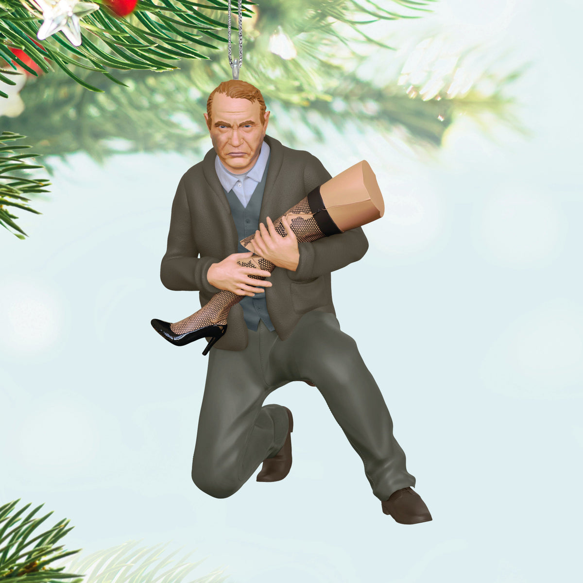 A Christmas Story, Family Controversy — 2025 Hallmark Keepsake Christmas Ornament, depicting Old Man Parker holding a leg lamp in a detailed design.