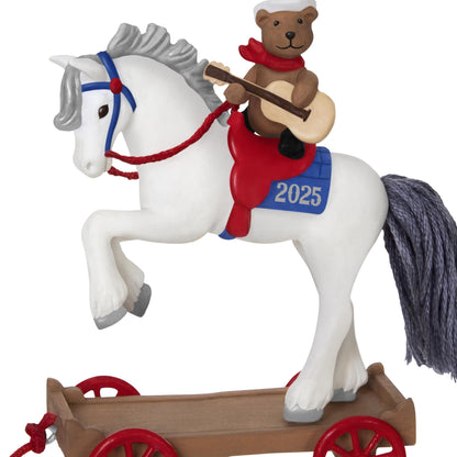 A Pony for Christmas, 28th in the Series — 2025 Hallmark Keepsake Christmas Ornament featuring a teddy bear with guitar riding a white horse.