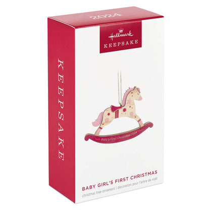 Baby girl's first Christmas rocking horse wood — Hallmark Keepsake Christmas ornament in gift packaging, featuring pink and gold design.