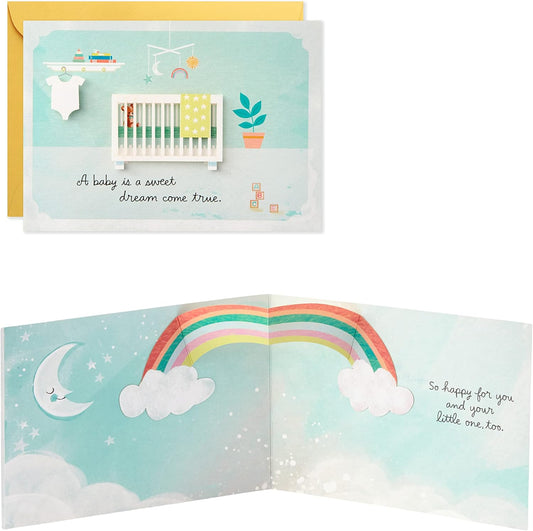 Hallmark Paper Wonder Pop Up Baby Shower Card (Sweet Dream Come True) with nursery scene, pop-up rainbow, and congratulatory message.