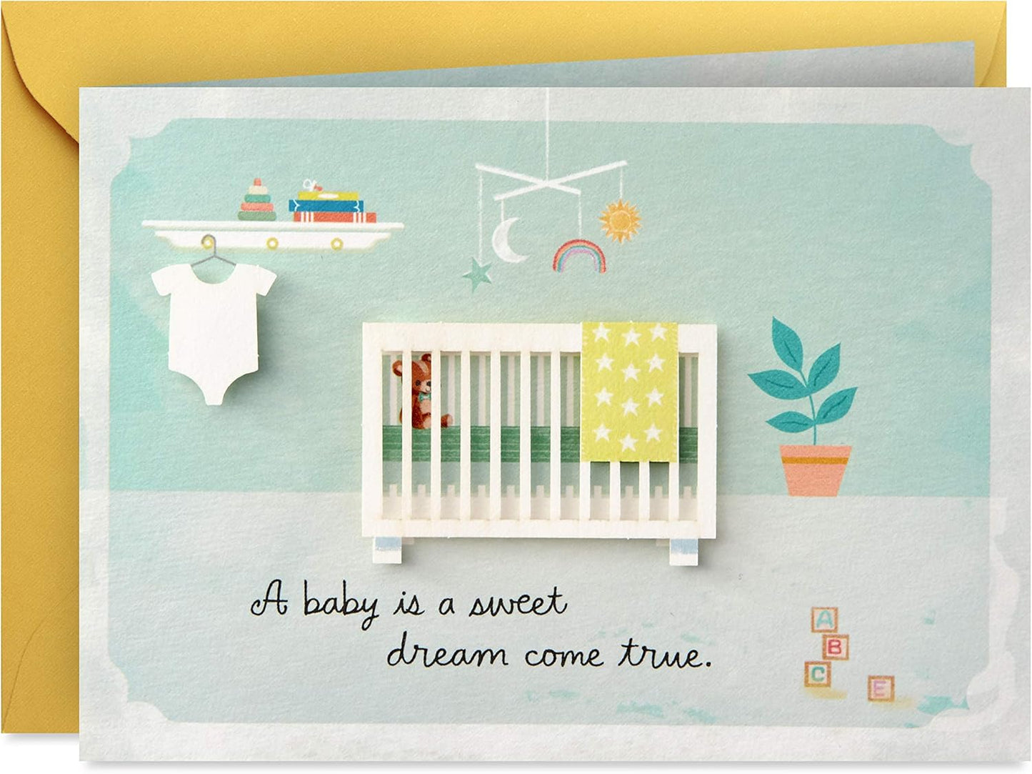 Hallmark Paper Wonder Pop Up Baby Shower Card (Sweet Dream Come True) featuring a nursery design with a crib and decor.