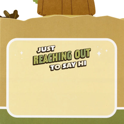 Hallmark Paper Wonder Star Wars™ Baby Yoda Pop Up Father's Day Card, Birthday Card, or Any Occasion (Reaching Out) with text saying 'just reaching out to say hi' in colourful font.
