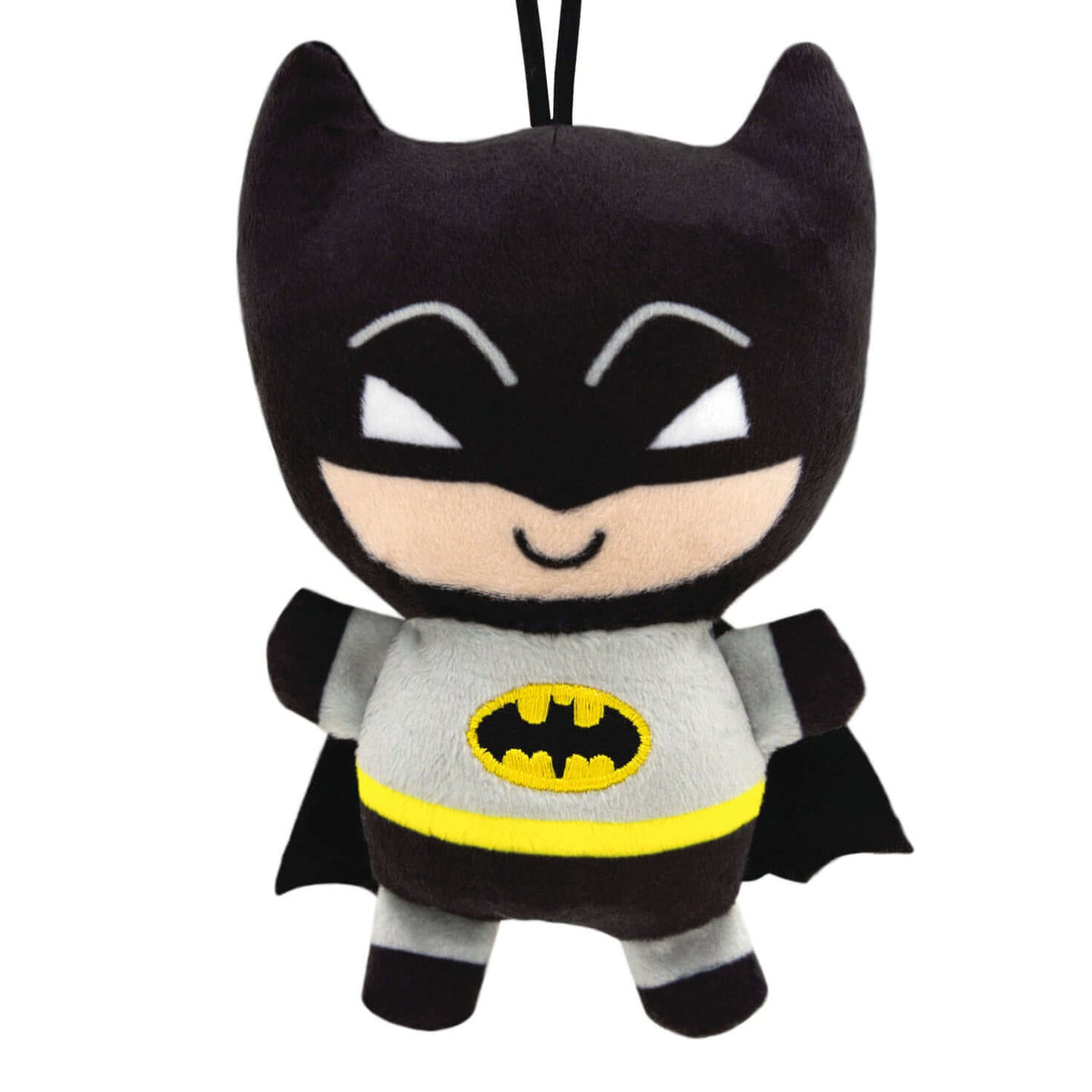 DC Batman, plush fabric - Hallmark Christmas ornament featuring a cute smiling design with bat wings and yellow logo, hanging view.