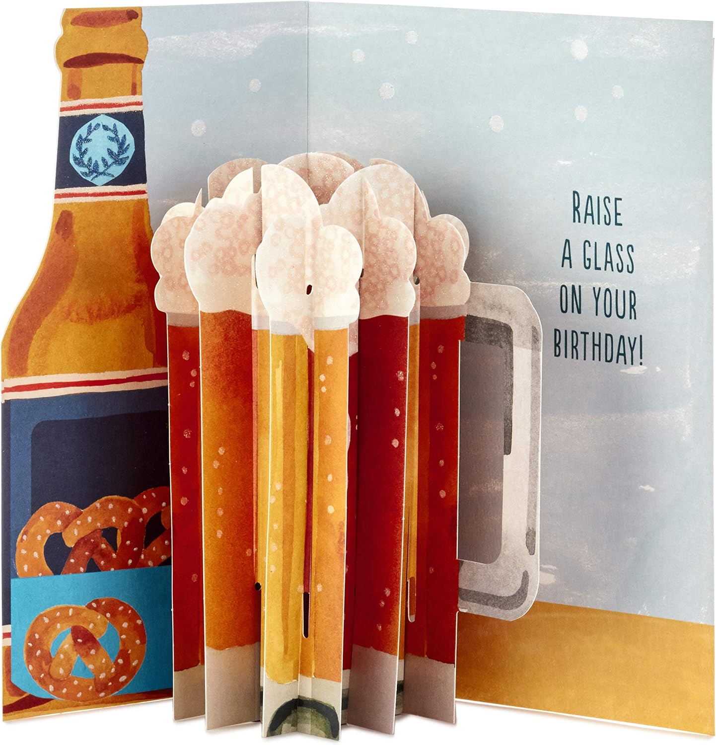 Hallmark Paper Wonder Displayable Pop Up Birthday Card (Beer) features a 3D pop up of frothy mugs and a beer bottle with pretzels.