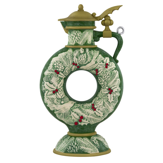 Beer Stein — 2025 Hallmark Keepsake Christmas Ornament, green ceramic with holly and evergreen wreath design, angled view