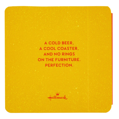 Beers to You: 20 Coasters to Say Cheers to Book, humorous yellow coaster with text on a flat lay background.