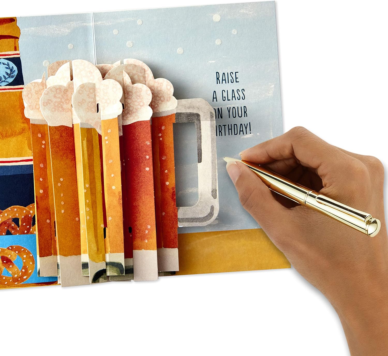 Hallmark Paper Wonder Displayable Pop Up Birthday Card (Beer) featuring a 3D pop-up of frothy mugs and a handwritten message.