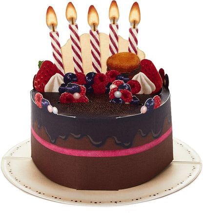 Hallmark Pop Up Birthday Card (Chocolate Cake) featuring a 3D design of a chocolate cake with candles, berries and decorative elements.