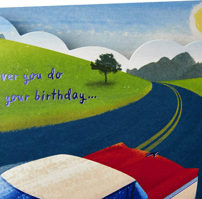 Hallmark Paper Wonder Displayable Pop Up Birthday Card (Classic Car) detail featuring a landscape with text on a winding road.