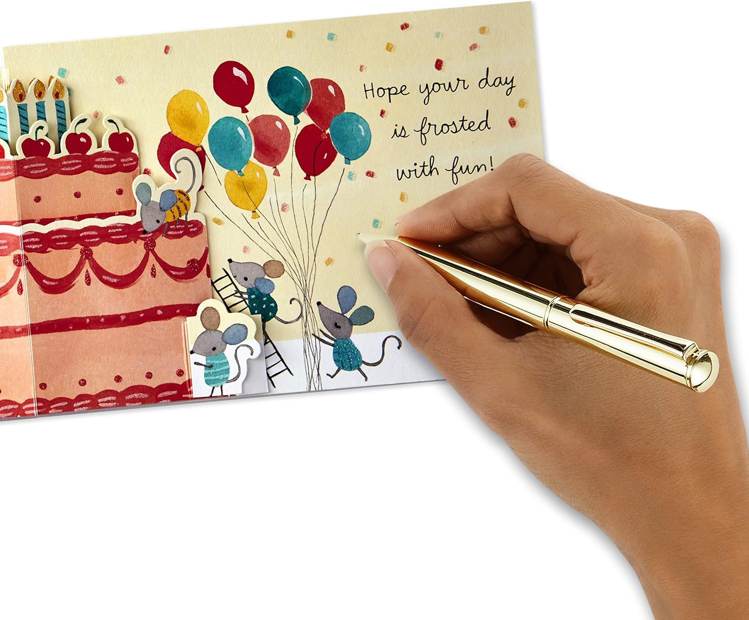 Hallmark Paper Wonder Pop Up Birthday Card (Birthday Mice) featuring a decorated birthday cake and colourful balloons with hand writing a message.