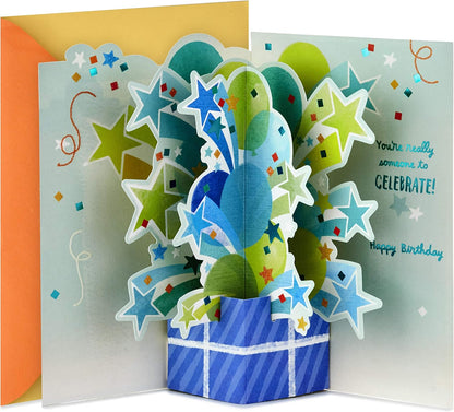 Hallmark Paper Wonder Pop Up Birthday Card (Someone to Celebrate) featuring colourful 3D balloons and stars in a surprise exploding box design.